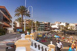 Salinetas beach promenade and palm trees