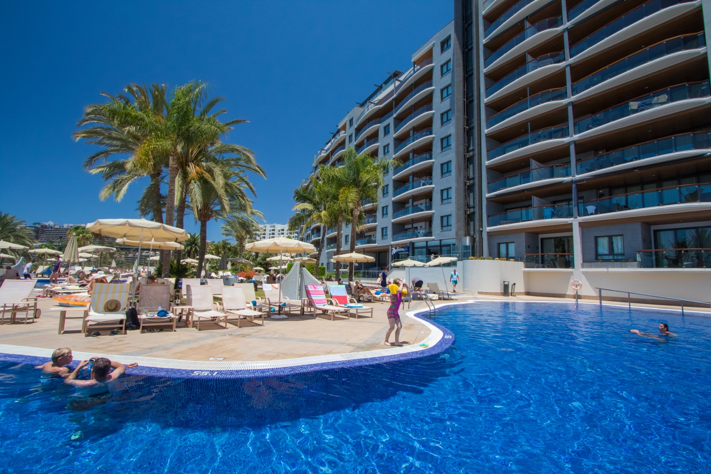 Radisson Blu pool and palm trees