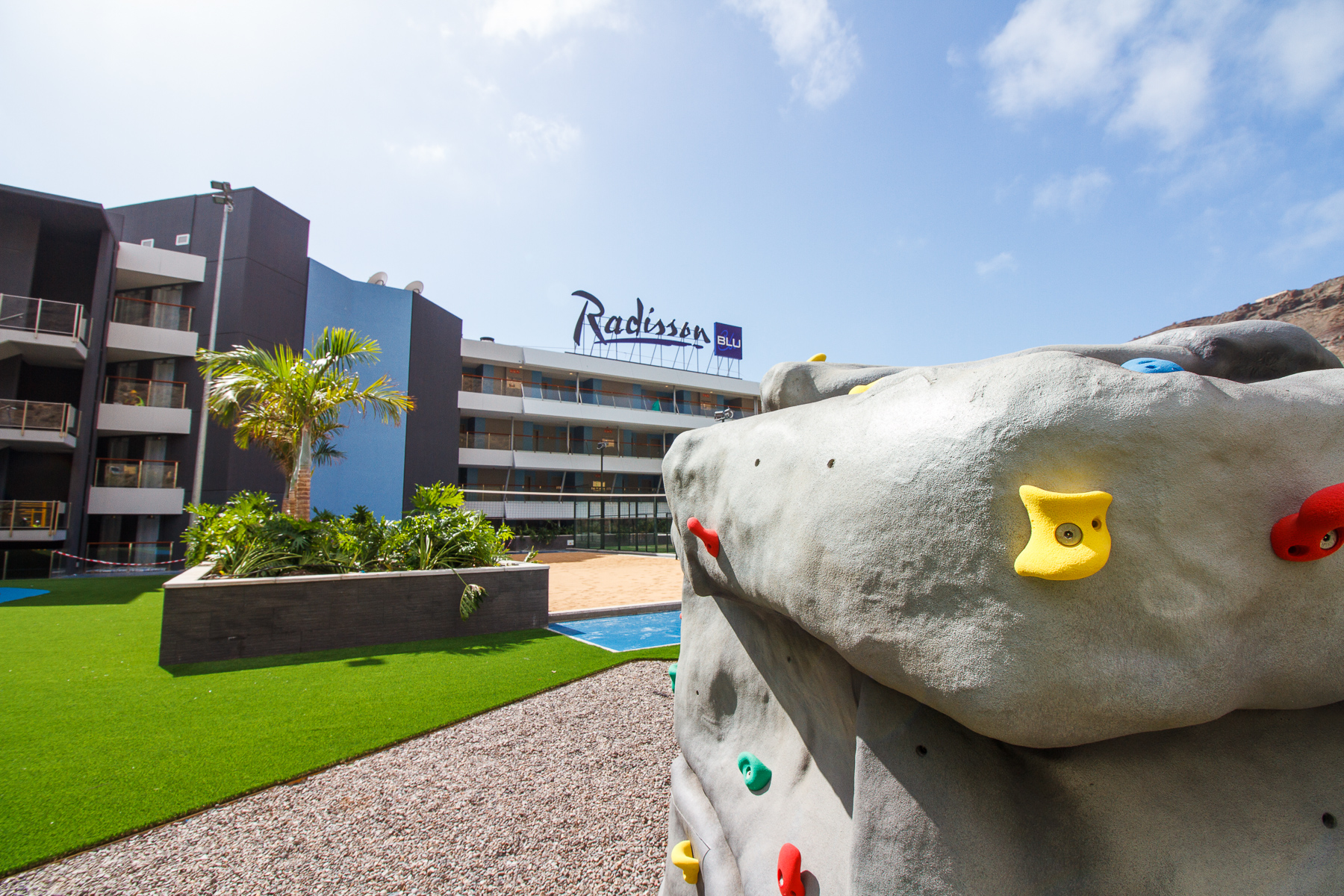 Radisson Blue climbing wall and beach volleyball court